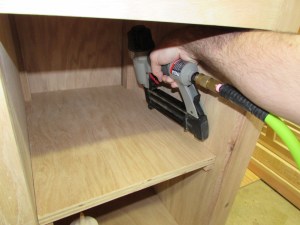 Glueing and nailing the shelf