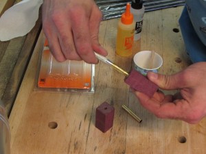 Inserting epoxied tubes