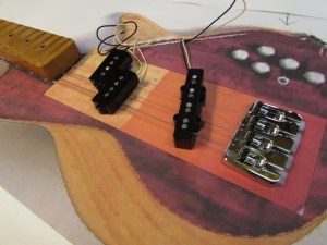 Locating pickups and tail piece