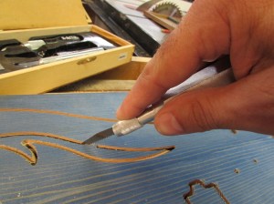 Trimming out the remaining F-hole blank