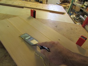 Peeling away the glue squeeze-out